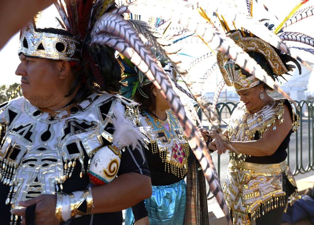 Members of the Danza Tonantzi Guadalupana Las Vegas dance group, including Beda Quintana, cente ...