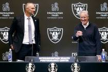 The new Raiders general manager John Spytek, left, watches as new head coach Pete Carroll react ...