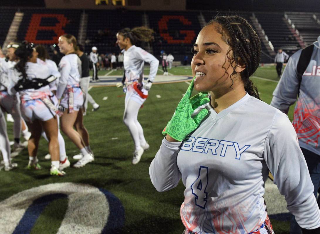 Liberty’s Kilolo Westerlund pulls off her gloves after the 5A flag football state quarte ...