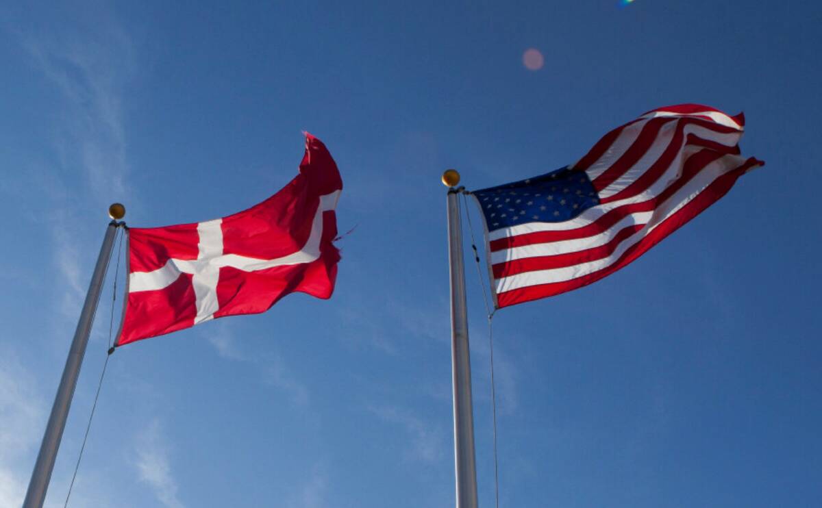 The U.S. and Danish flags fly near Blair, Neb. (AP Photo/Nati Harnik, File)