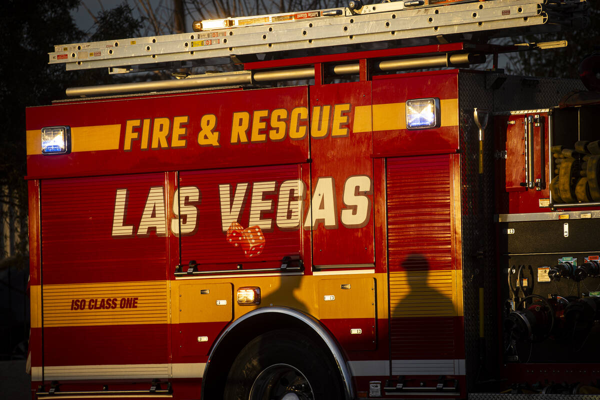 Las Vegas police and firefighters respond to the scene where a man died after being found unres ...