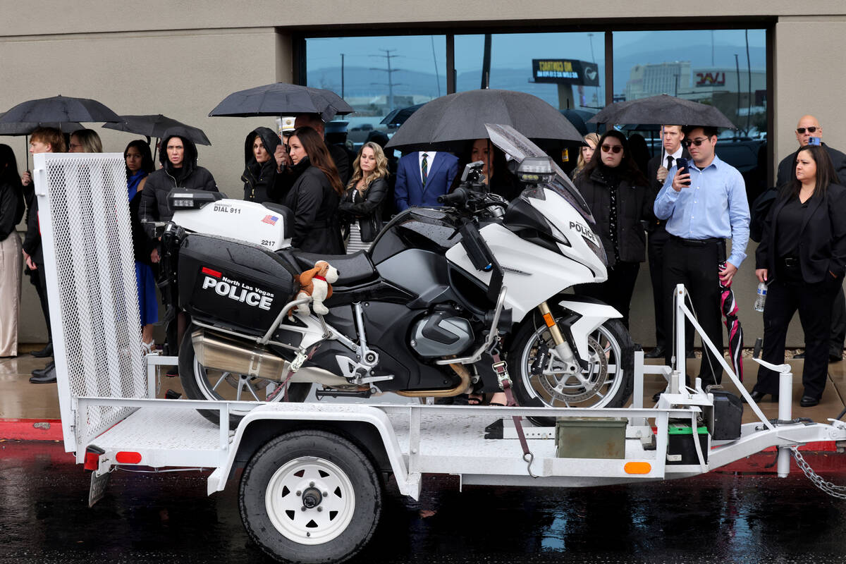 Mourners gather during the celebration of life service for fallen North Las Vegas police office ...