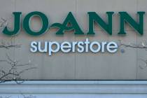 A logo sign outside of a Joann retail store is seen in Arlington Heights, Ill., Wednesday, Jan. ...