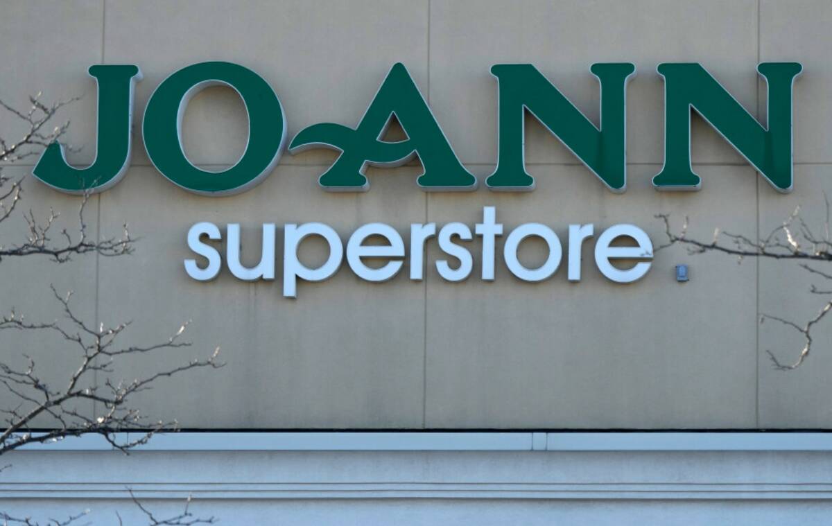 A logo sign outside of a Joann retail store is seen in Arlington Heights, Ill., Wednesday, Jan. ...