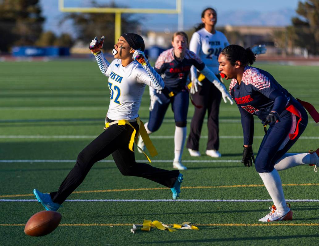 Sierra Vista receiver Danielle Livingston (32) scores before her flag is pulled by Coronado lin ...