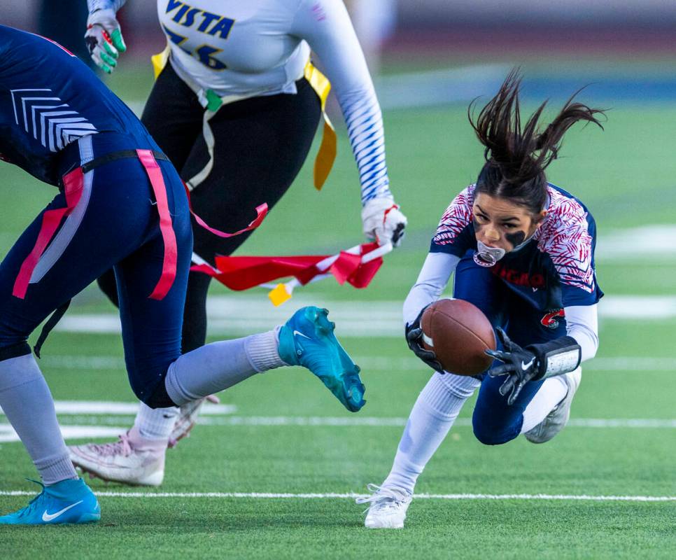 Coronado running back Maddy Aguilar (2) nearly evades a flag pull by Sierra Vista defender Aman ...