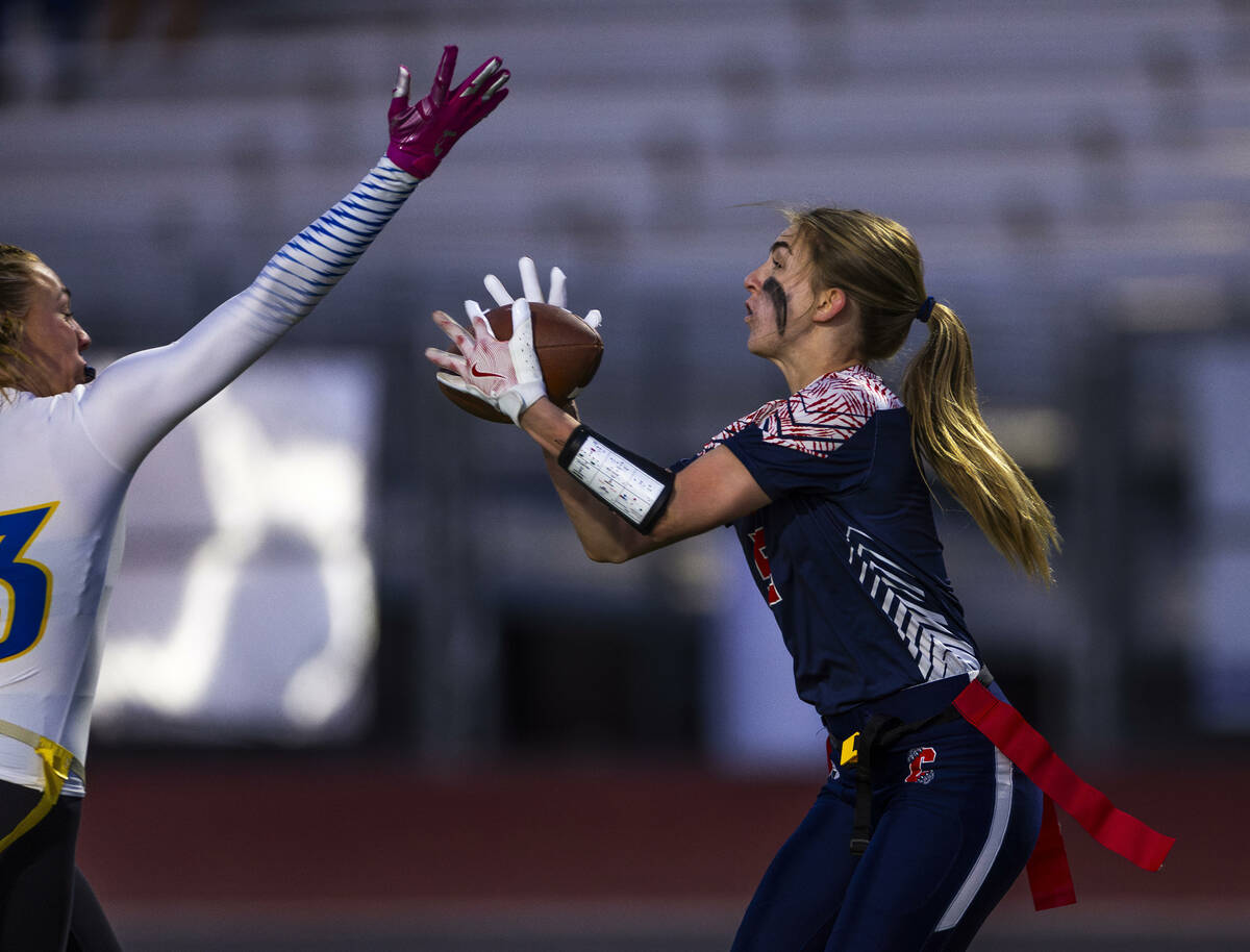 Coronado receiver MaryLou Tsunis (9) hauls in a touchdown pass just past the hand of Sierra Vis ...