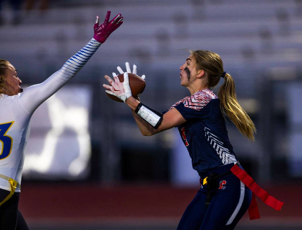 Coronado receiver MaryLou Tsunis (9) hauls in a touchdown pass just past the hand of Sierra Vis ...