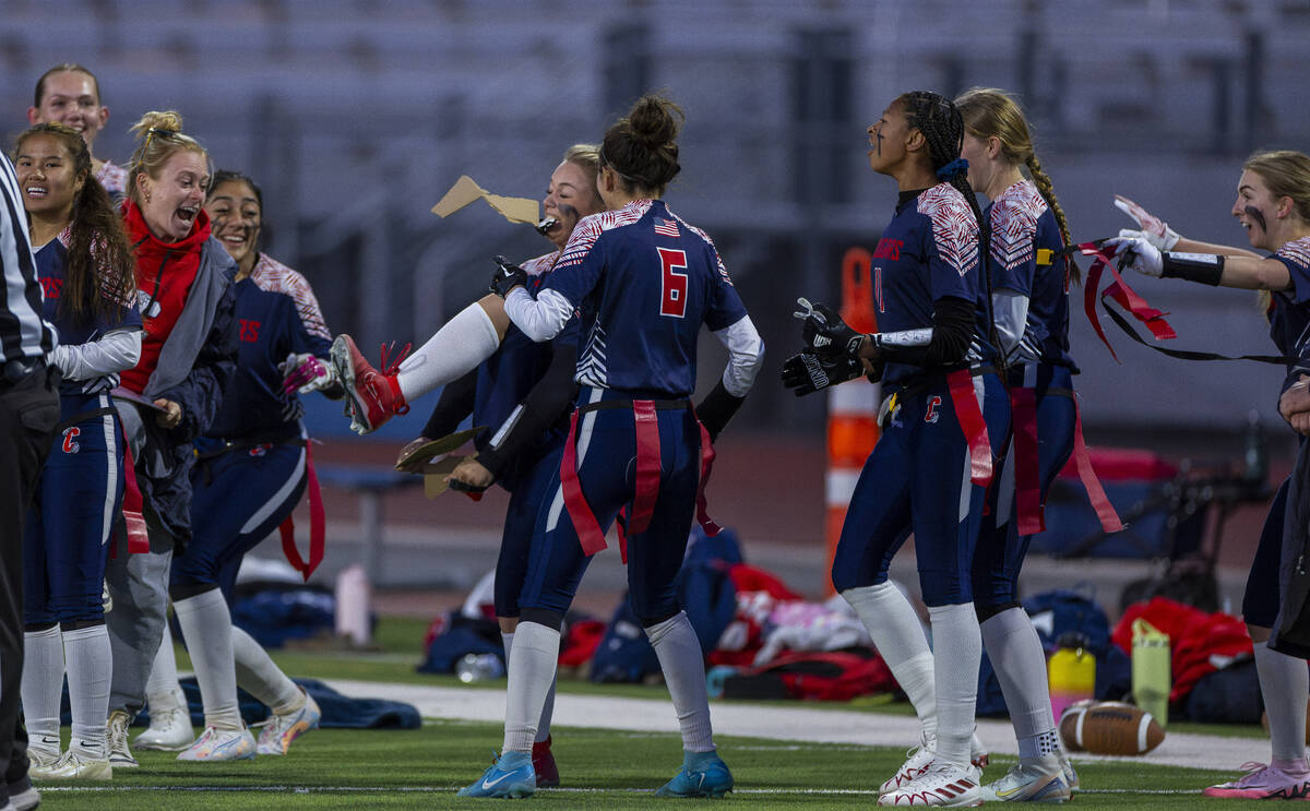 Coronado quarterback Bailey Goldberg (1) breaks aboard on the sideline following an interceptio ...