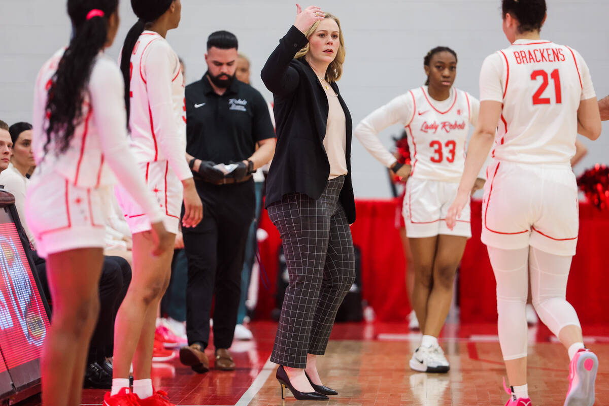 Lady Rebels head coach Lindy La Rocque coaches her team from the sidelines during a women&#x201 ...