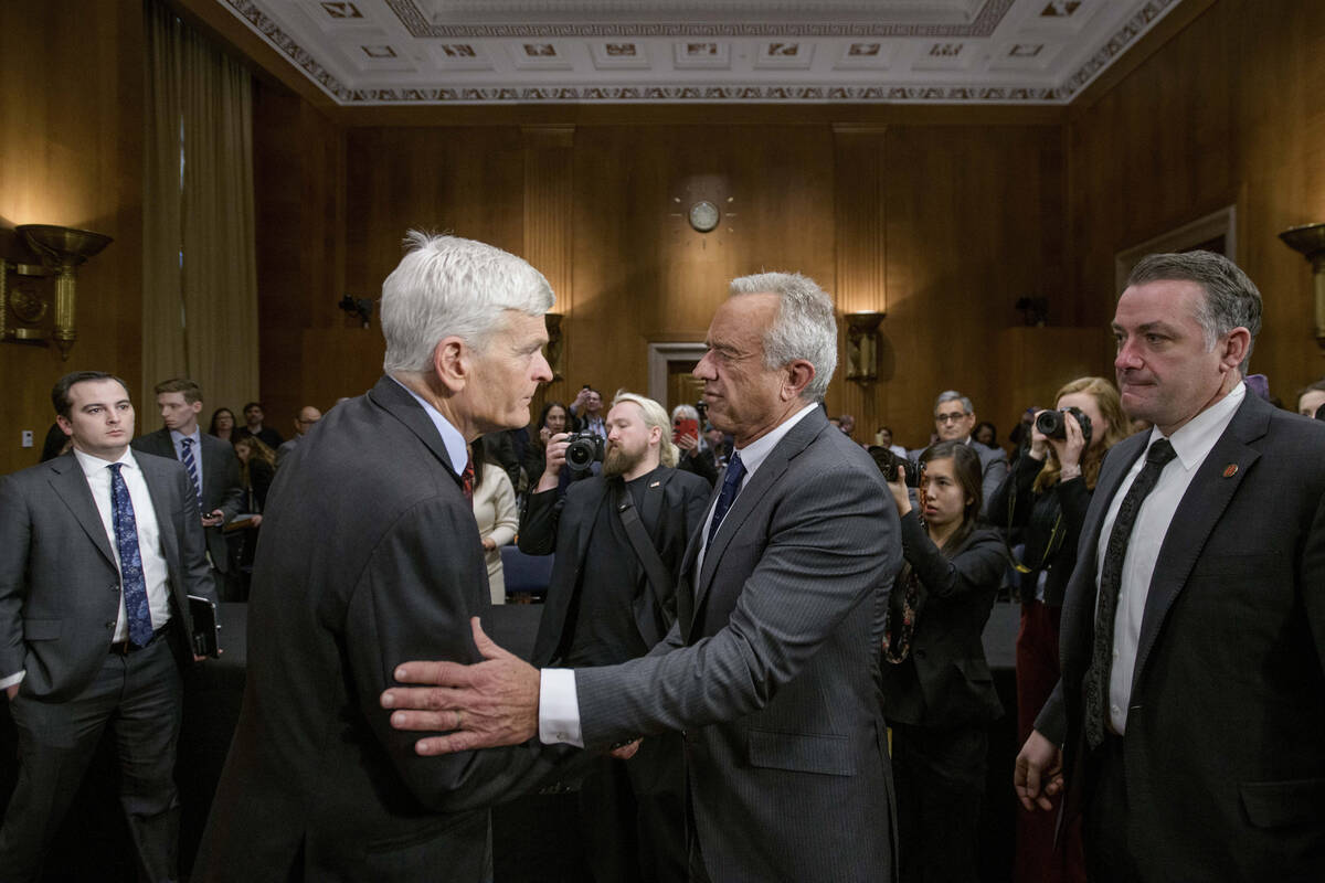 Robert F. Kennedy, Jr., right, President Donald Trump's nominee to serve as Secretary of Health ...