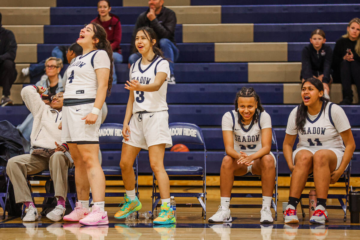 Shadow Ridge players cheer for their teammates from the sidelines during a 5A girls state quart ...