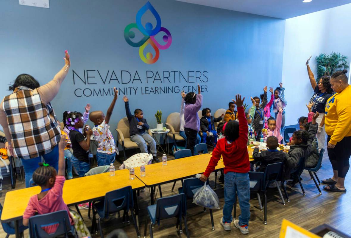 Attendees gather after breakfast as the Southern Nevada Black Educators Initiative launch their ...