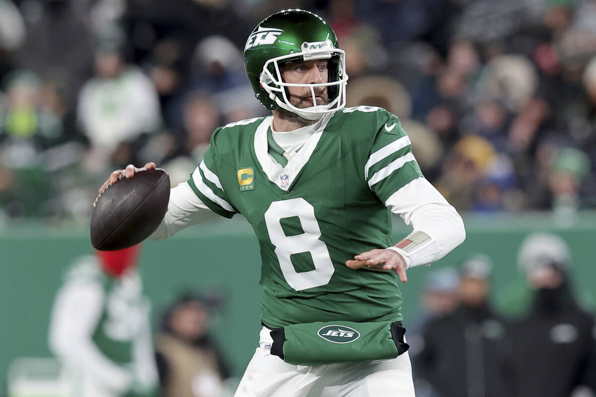 New York Jets quarterback Aaron Rodgers (8) in action against the Miami Dolphins during an NFL ...