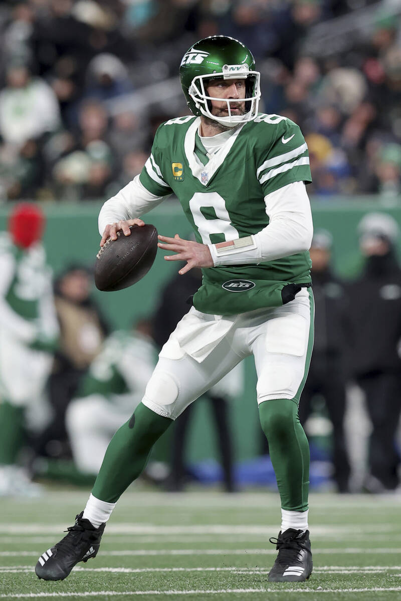 New York Jets quarterback Aaron Rodgers (8) in action against the Miami Dolphins during an NFL ...