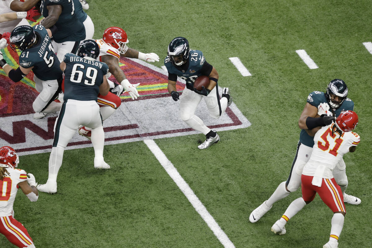 Philadelphia Eagles running back Saquon Barkley (26) runs the ball against the Kansas City Chie ...