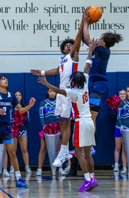 Bishop Gorman's Trey McKinney (4) blocks a shot by Centennial's Jayonni Durrough (25) during th ...