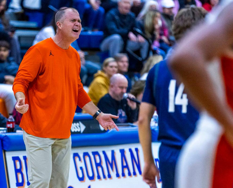 Bishop Gorman head coach Grant Rice argues a call in favor of Centennial during the first half ...
