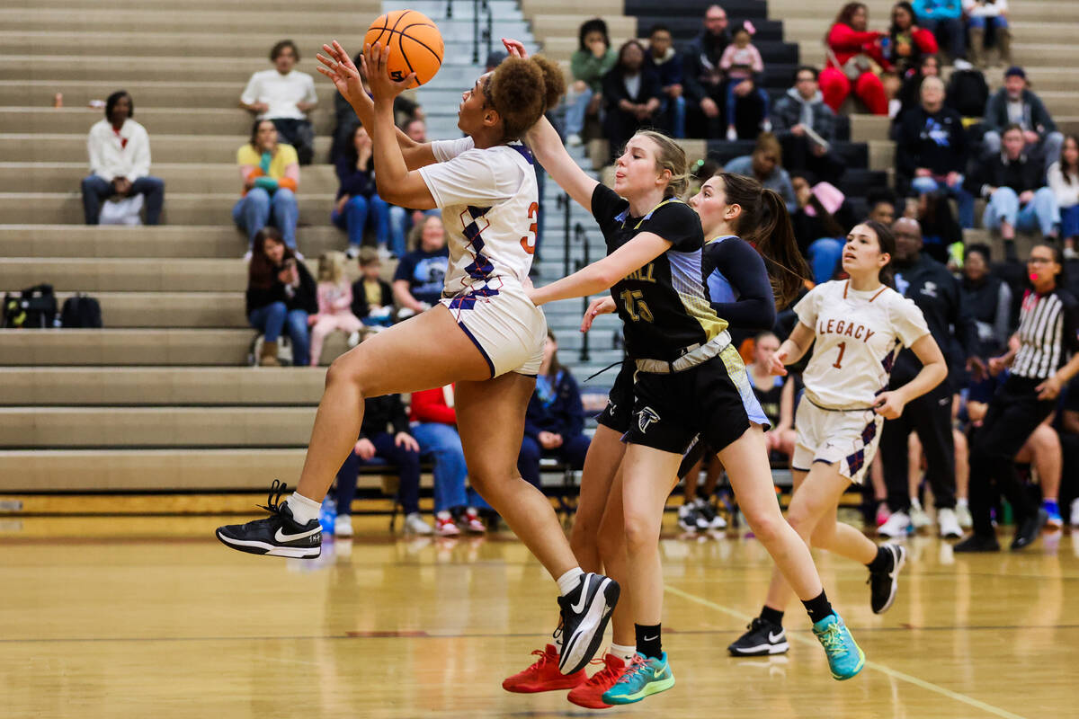 Legacy’s Ajalee Williams (32) goes up for a shot during the 4A girls basketball southern ...