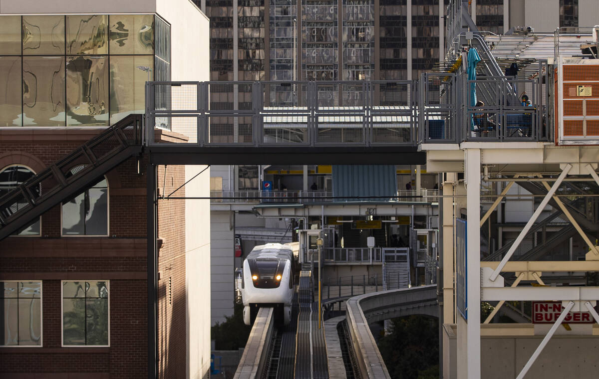 A Las Vegas Monorail train heads northbound from the Flamingo & Caesars Palace station on S ...