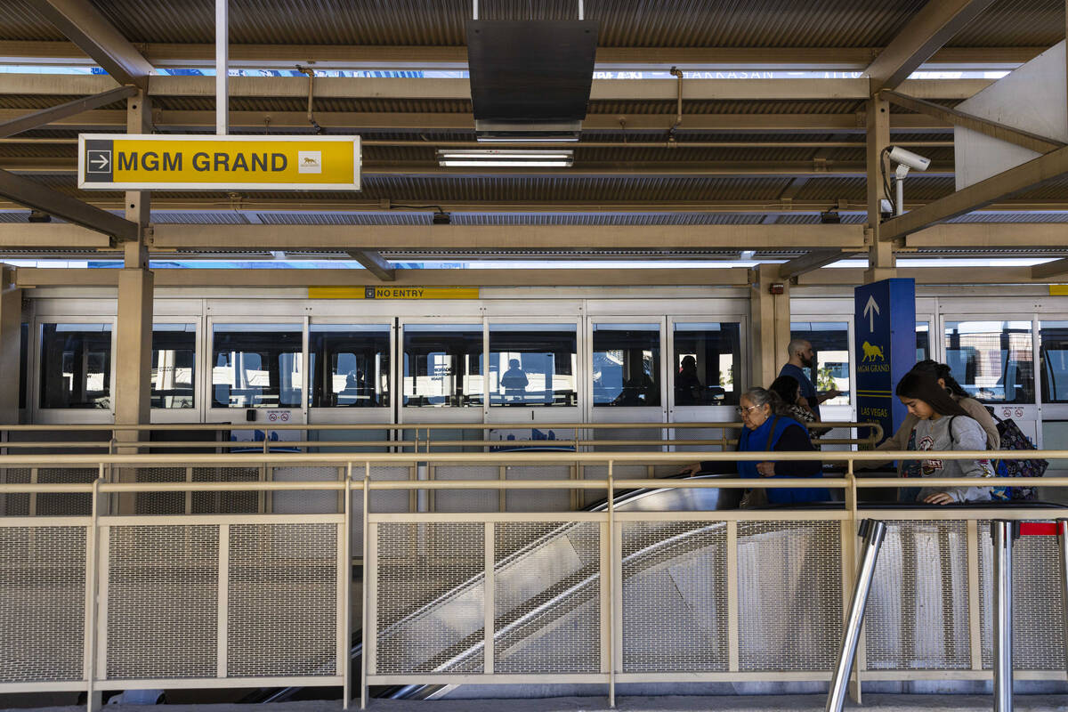 Las Vegas Monorail passengers head towards the exit at the MGM Grand station on Sunday, Feb. 16 ...