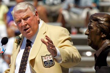 In this Aug. 5, 2006, file photo, former Oakland Raiders coach John Madden gestures toward a bu ...