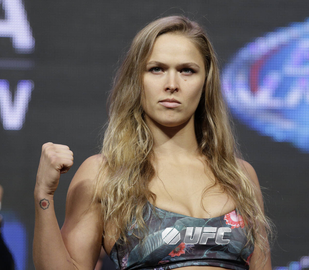 Ronda Rousey poses for photographers during a weigh-in for the UFC 175 mixed martial arts event ...