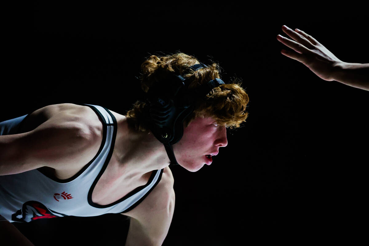 Desert Oasis wrestler Chance Mannino eyes his opponent during the 4A state wrestling meet at We ...