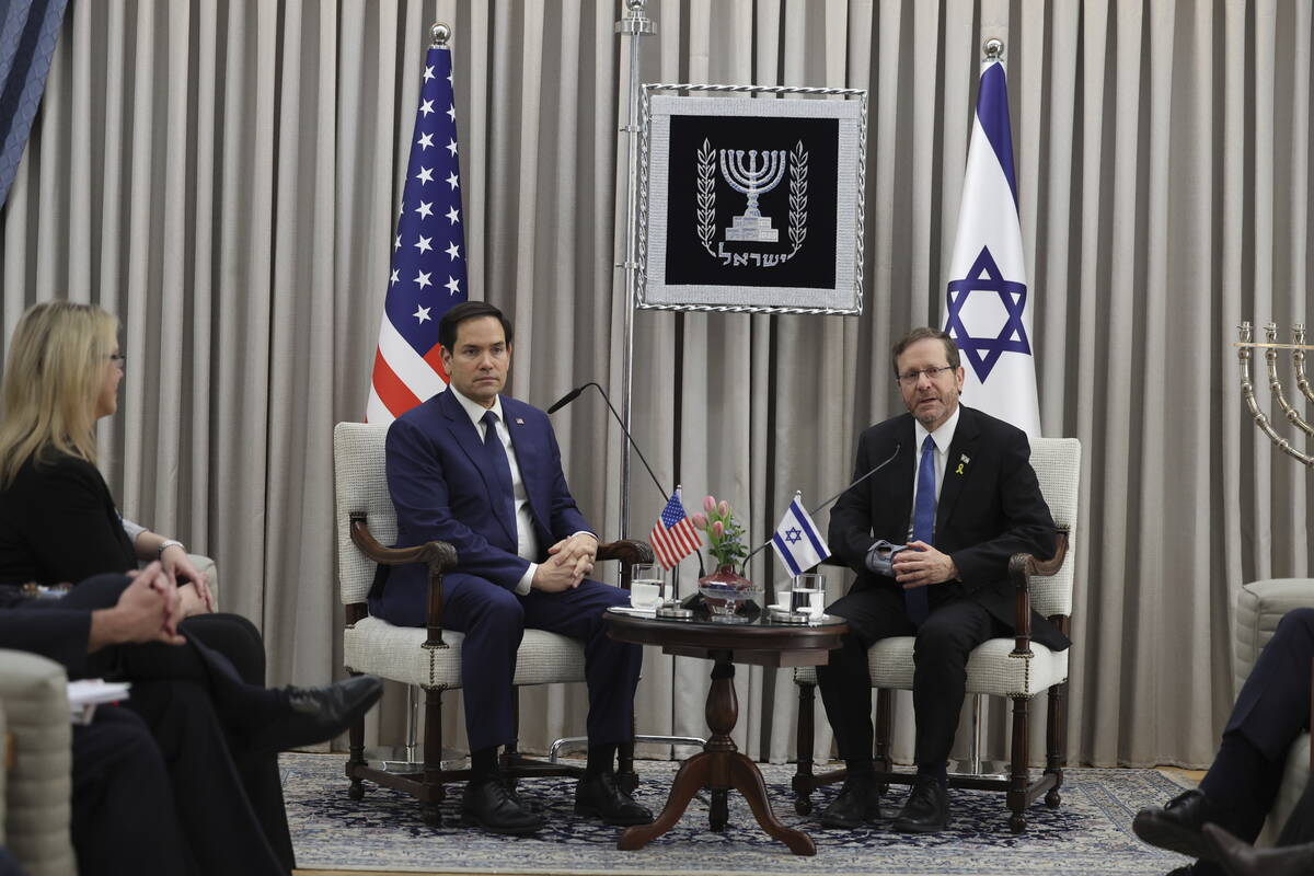 U.S. Secretary of State Marco Rubio, centre left, meets with Israeli President Isaac Herzog in ...