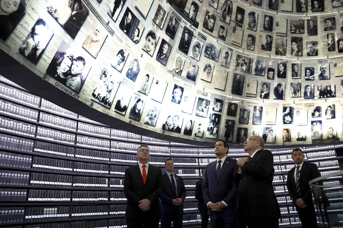 U.S. Secretary of State Marco Rubio, front center, accompanied by Chairman of Yad Vashem Dani D ...