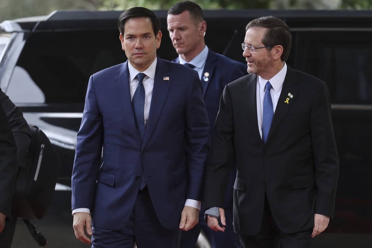 U.S. Secretary of State Marco Rubio, left, meets with Israeli president Isaac Herzog, right, in ...