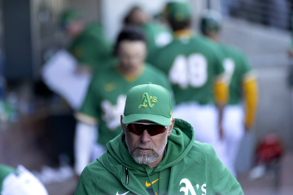 Oakland Athletics manager Mark Kotsay leaves the dugout after an MLB exhibition game against th ...