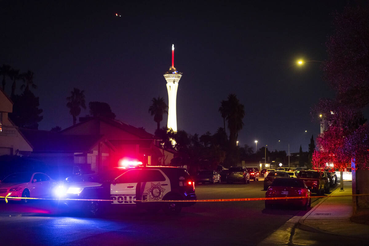 Las Vegas police respond to a homicide off Naco Court as seen from Paseo Del Prado near Sahara ...
