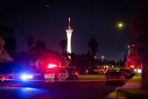 Las Vegas police respond to a homicide off Naco Court as seen from Paseo Del Prado near Sahara ...