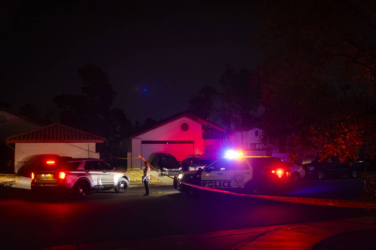 Las Vegas police respond to a homicide off Naco Court as seen from Paseo Del Prado near Sahara ...