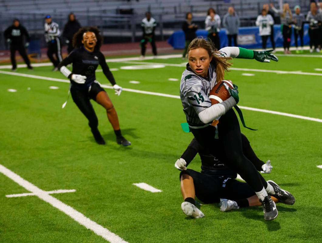 Palo Verde's Alexis Manzo (15) runs the ball during a flag football game at Shadow Ridge High S ...