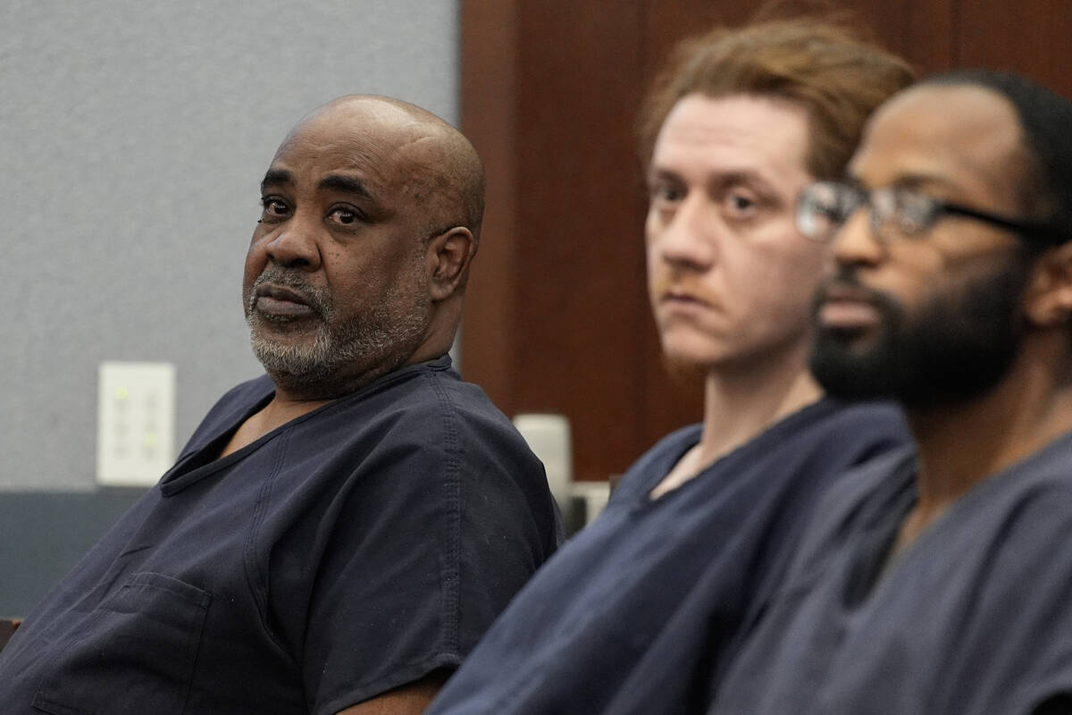 Duane "Keffe D" Davis, left, appears in District Court for his alleged involvement in the 1996 ...