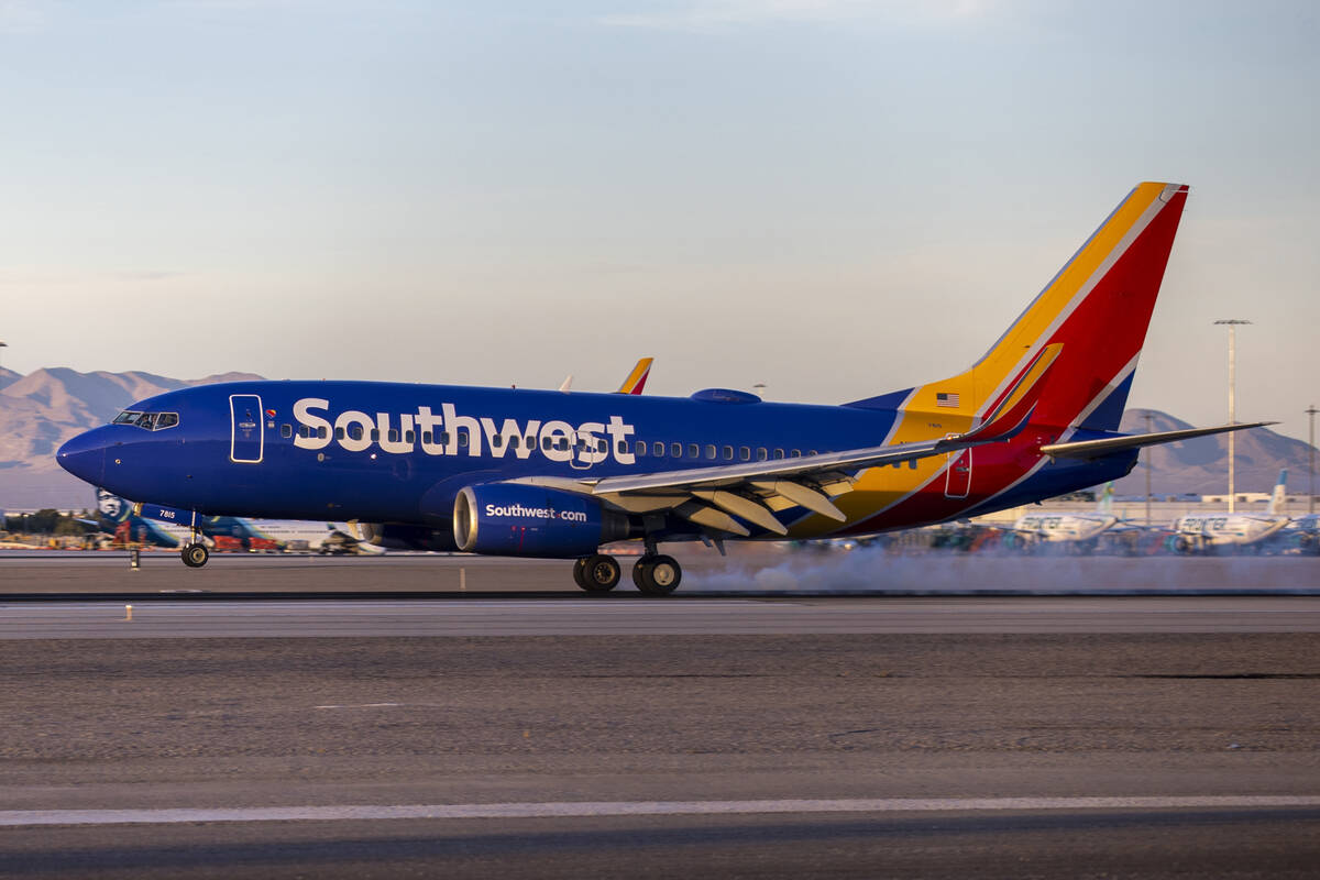 A Southwest Airlines flight lands at Harry Reid International Airport, Tuesday, Nov. 19, 2024, ...