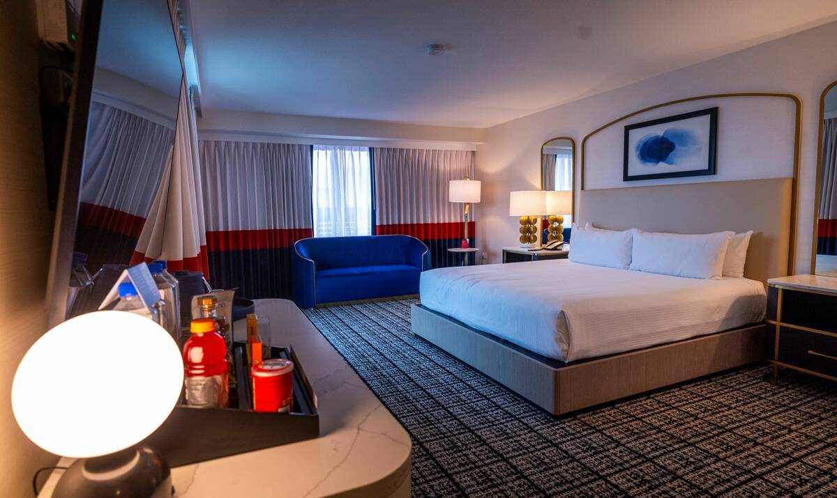 A bedroom in a balcony suite in the Paris casino-hotel as Caesars Entertainment has spent hundr ...