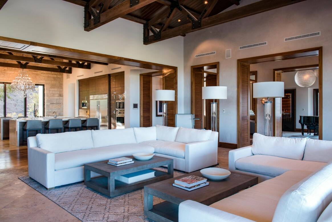 A view of the living and dining area of the estate at 5 Promontory Pointe Lane. (Simply Vegas)