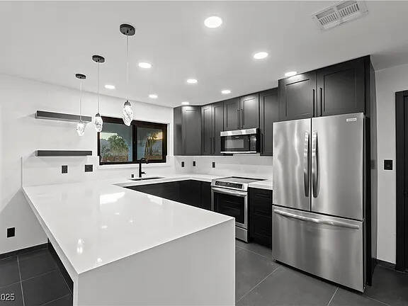 Located in Moapa at 4255 West State Highway 168, this equestrian facility includes two homes, a ...