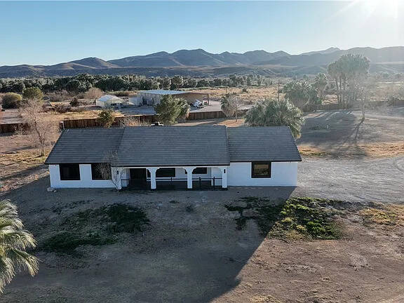 Located in Moapa at 4255 West State Highway 168, this equestrian facility includes two homes, a ...