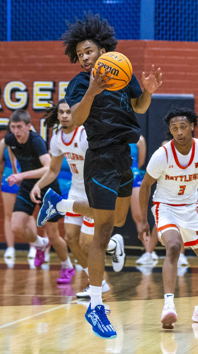 Silverado guard Jaden Charles (4) elevates to catch a long pass against Mojave during the first ...