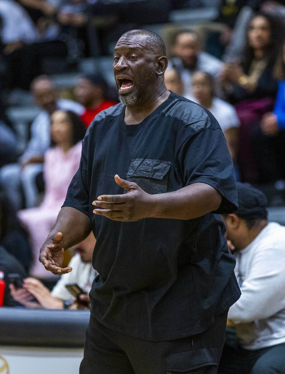 Silverado head coach Cyril Franklin yells to his players against Mojave during the first half o ...