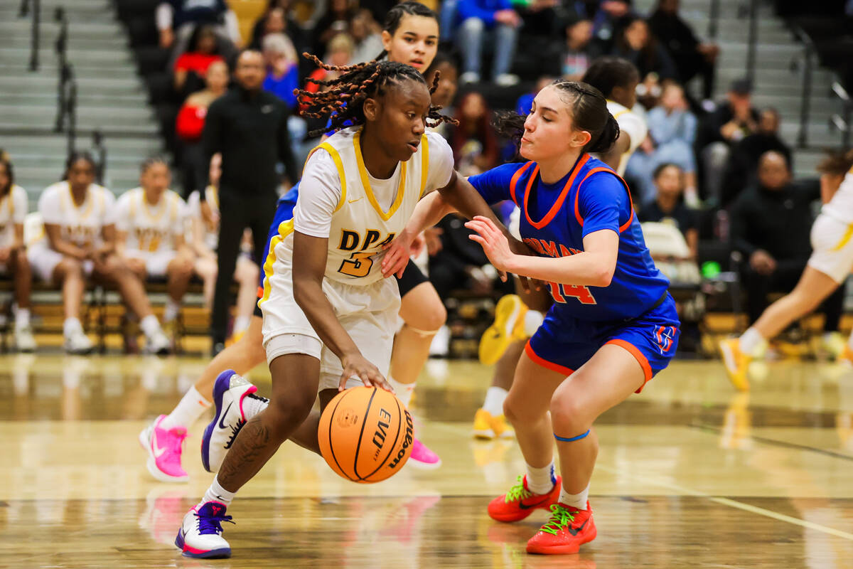 Democracy Prep point guard Bray’ana Miles (3) dribbles the ball during a Class 5A girls baske ...
