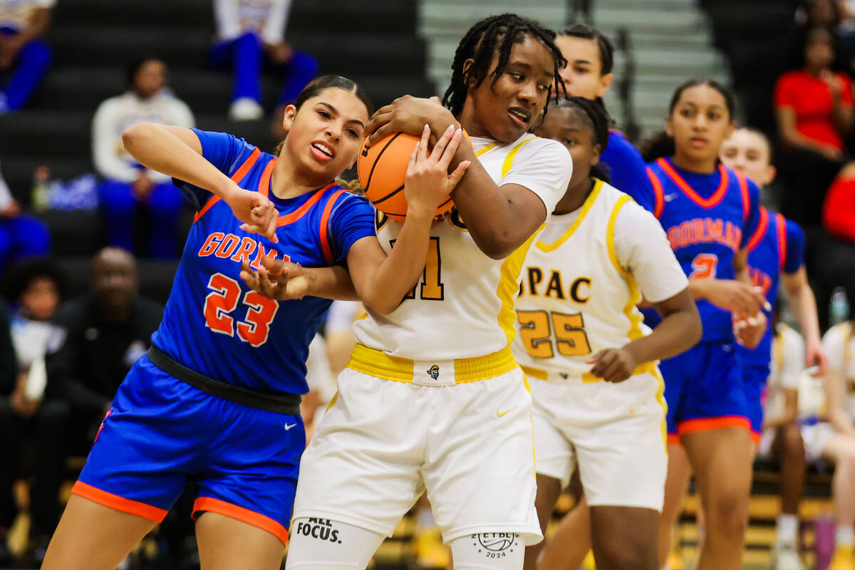 Democracy Prep forward La'Niah Hicks (11) keeps the ball in her grip during a Class 5A girls ba ...