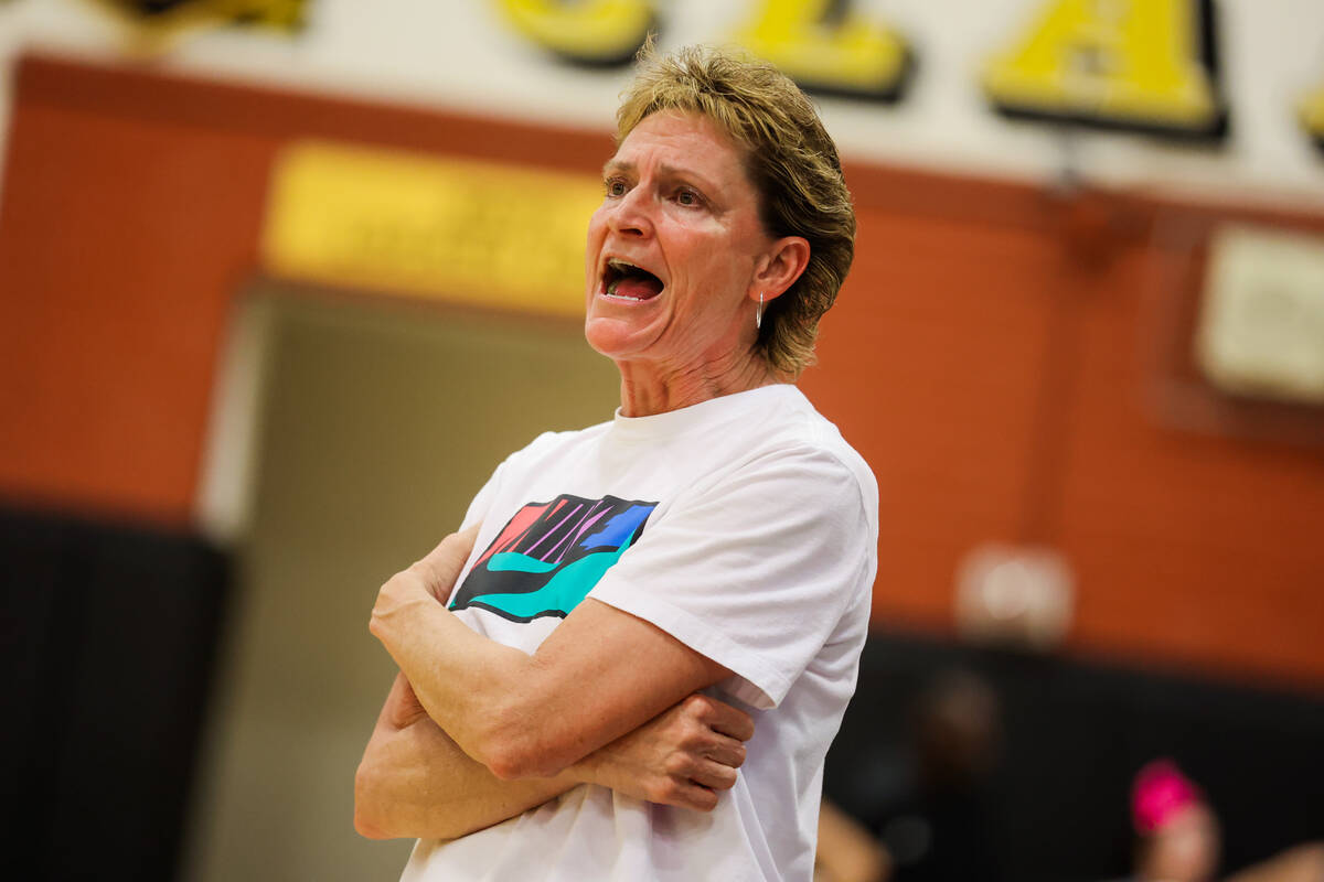 Centennial head coach Karen Weitz coaches from the sidelines during a class 5A girls basketball ...