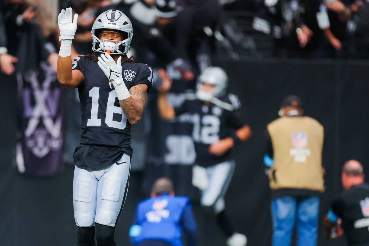 Raiders wide receiver Jakobi Meyers (16) is introduced as a starter during an NFL football game ...