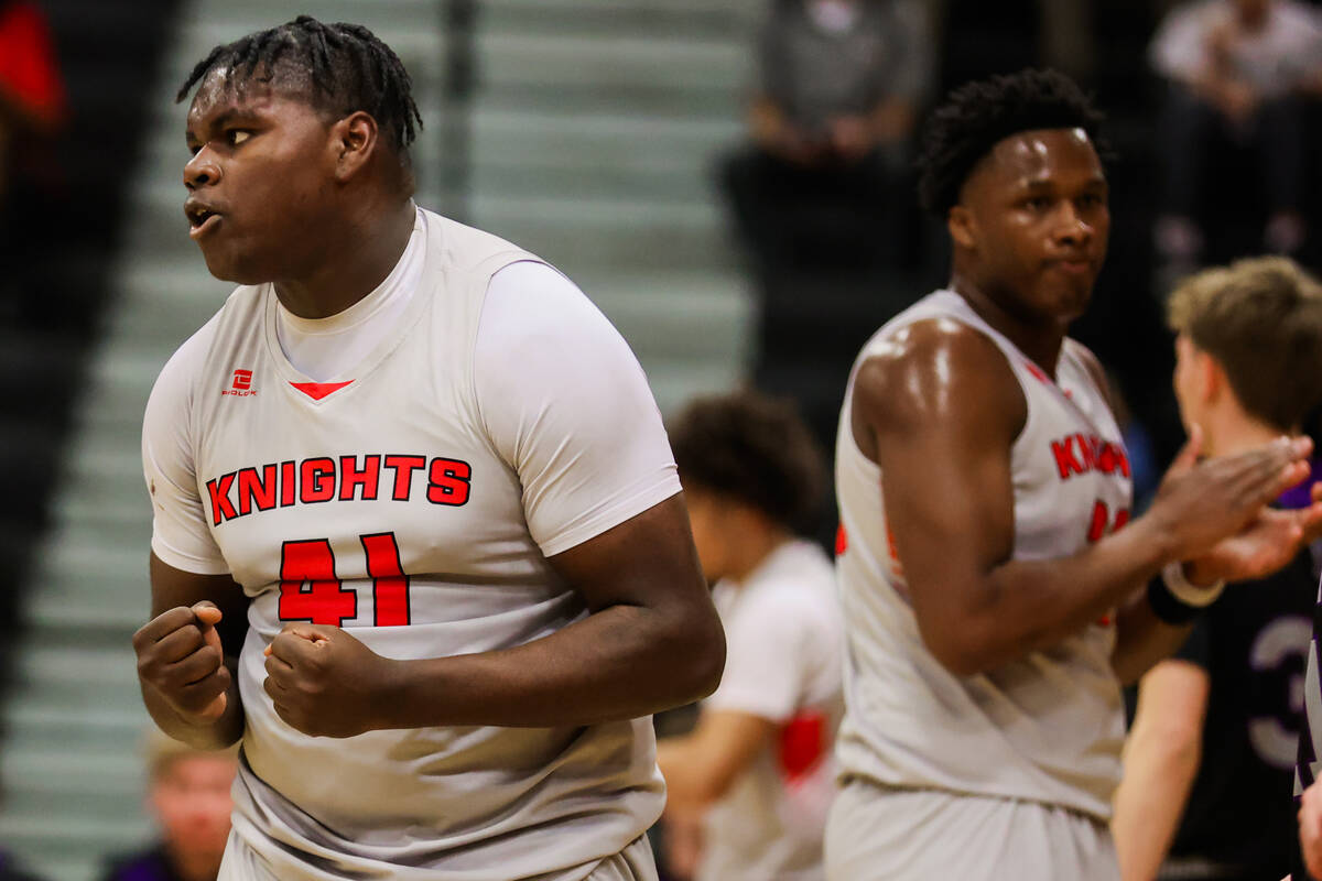 Mater East center Kenden Jones celebrates drawing a foul during a class 3A semifinals basketbal ...