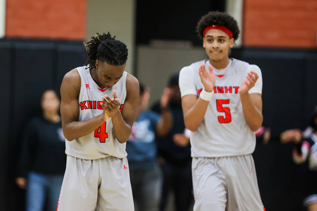 Mater East point guard Miles Williams (4) claps during a class 3A semifinals basketball game be ...